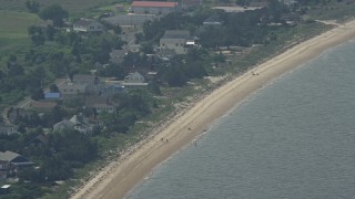 AX72_046 - 5.1K aerial stock footage of beach goers at Slaughter Beach, Delaware
