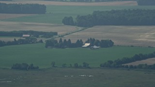 AX72_047 - 5.1K aerial stock footage of barns and farmland in Milford, Delaware