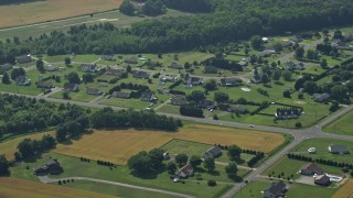 AX72_091 - 5.1K aerial stock footage of rural neighborhood in Hartly, Delaware