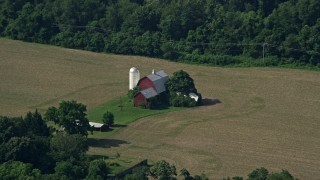 AX72_113 - 5.1K aerial stock footage of a barn and farm fields in Centreville, Maryland