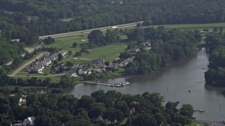 AX72_118 - 5.1K aerial stock footage of riverfront homes by Little Queenstown Creek in Queenstown, Maryland