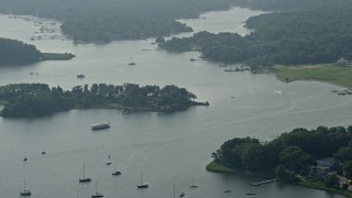 AX73_039 - 5.1K aerial stock footage of boats in Redhouse Cove on Gibson Island, Maryland