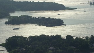 AX73_040 - 5.1K aerial stock footage of ferry on Redhouse Cove on Gibson Island, Maryland