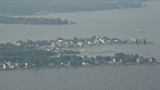 AX73_041 - 5.1K aerial stock footage of waterfront homes and a marina in Hawk Cove on Sparrows Point, Maryland