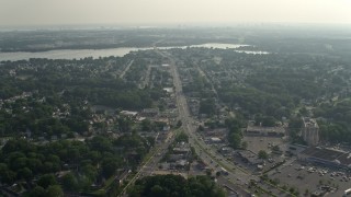 AX73_054E - 5.1K aerial stock footage of Eastern Boulevard and suburban neighborhoods in Essex, Maryland