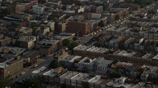 AX73_141 - 5.1K aerial stock footage of urban row houses in Baltimore, Maryland