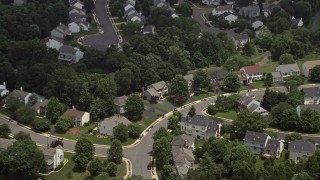 AX74_002E - 4.8K aerial stock footage flying Over Suburban Residential Neighborhoods in Manassas, Virginia