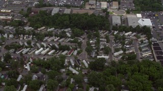 AX74_005 - 4.8K aerial stock footage of a bird's eye view of a trailer park in Manassas, Virginia