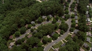 AX74_015E - 4.8K aerial stock footage of a bird's eye view of suburban neighborhoods in Fairfax, Virginia