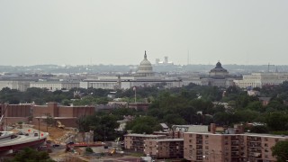 AX74_041 - 4.8K aerial stock footage of the United States Capitol and Thomas Jefferson Building Domes in Washington DC