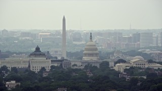 AX74_045E - 4.8K aerial stock footage of Washington Monument, Library of Congress buildings, and United States Capitol Dome in Washington DC