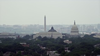 AX74_056E - 4.8K stock footage aerial video of the United States Capitol, Thomas Jefferson and John Adams Buildings, and the Washington Monument in Washington DC