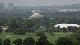 AX74_066 - 4.8K aerial stock footage of the Jefferson Memorial and trees in West Potomac Park in Washington DC