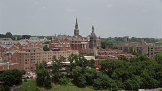 AX74_083 - 4.8K aerial stock footage flying by Georgetown University in Washington DC