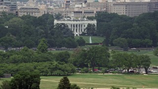 AX74_087 - 4.8K aerial stock footage of The White House and the South Lawn in Washington DC