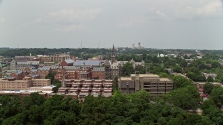 AX74_101 - 4.8K aerial stock footage flying by the campus of Georgetown University in Washington DC