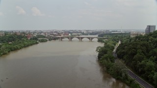 AX74_103 - 4.8K aerial stock footage of Francis Scott Key Bridge spanning the Potomac River in Washington DC