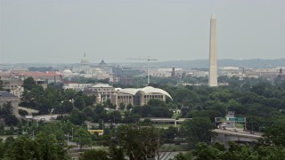 AX74_107 - 4.8K aerial stock footage of the United States Capitol, United States Institute of Peace, and the Washington Monument in Washington DC