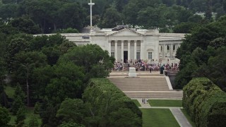 AX74_112 - 4.8K aerial stock footage of tour groups at the Tomb of the Unknown Soldier at Arlington National Cemetery, Washington DC