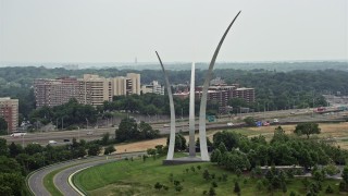 AX74_116 - 4.8K aerial stock footage flying by the United States Air Force Memorial at Arlington National Cemetery, Washington DC
