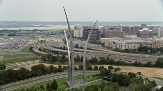AX74_118 - 4.8K aerial stock footage orbiting United States Air Force Memorial to reveal The Pentagon in Washington, DC