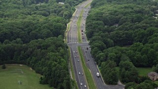 AX74_139 - 4.8K aerial stock footage of light traffic on Fairfax County Parkway in Burke, Virginia