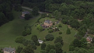 AX75_010 - 4.8K aerial stock footage approaching and tilting down to isolated home in the country, Clifton, Virginia
