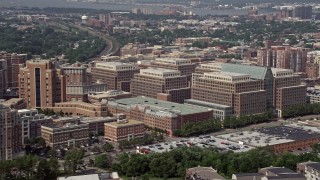 AX75_035E - 4.8K aerial stock footage of government offices by United States Patent and Trademark Office in Alexandria, Virginia