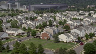AX75_048 - 4.8K aerial stock footage flying by military housing at Bolling Air Force Base in Washington DC
