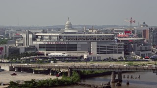 AX75_052 - 4.8K aerial stock footage of Nationals Park and the United States Capitol Dome in Washington DC