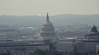 AX75_067E - 4.8K aerial stock footage of the United States Capitol and Thomas Jefferson Building domes in Washington DC