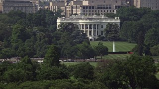 AX75_077E - 4.8K stock footage aerial video the White House and South Lawn, reveal part of Washington Monument in Washington DC