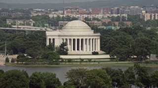 AX75_085 - 4.8K aerial stock footage approaching the Jefferson Memorial in Washington DC