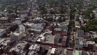 AX75_093 - 4.8K stock footage aerial video flying over buildings in Georgetown, Washington DC