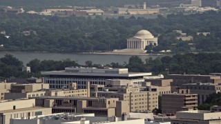 AX75_094 - 4.8K aerial stock footage of the Jefferson Memorial seen from Georgetown, Washington DC