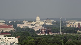 AX75_125 - 4.8K aerial stock footage of the United States Capitol, revealing Washington Monument and National Mall in Washington DC