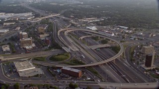AX76_022 - 4.8K aerial stock footage of Interstate 95 Interchange, Springfield, Virginia, sunset