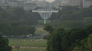 AX76_062 - 4.8K aerial stock footage flying by The White House, Washington D.C., sunset