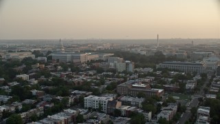 AX76_088 - 4.8K aerial stock footage of the Supreme Court, United States Capitol, Senate Buildings, Washington Monument in Washington D.C., sunset