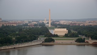 AX76_111 - 4.8K aerial stock footage of the United States Capitol, Washington Monument and National Mall, Lincoln Memorial, Washington D.C., sunset