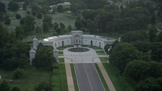 AX76_113 - 4.8K aerial stock footage of the Women in Military Service for America Memorial, Arlington National Cemetery, Virginia, twilight