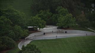 AX76_114 - 4.8K stock footage aerial video of President John F. Kennedy Gravesite at Arlington National Cemetery, Arlington, Virginia, twilight