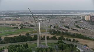 AX76_121E - 4.8K stock footage aerial video of United States Air Force Memorial, Arlington National Cemetery, Arlington, Virginia, twilight