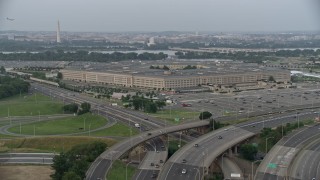 AX76_123 - 4.8K aerial stock footage approaching The Pentagon, Washington, D.C., twilight