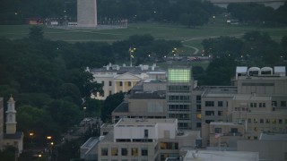 AX76_158 - 4.8K aerial stock footage revealing the White House and North Lawn Fountain, Washington, D.C., twilight