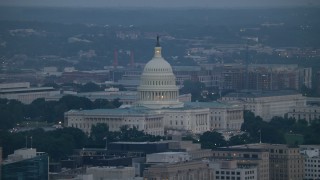 AX76_160 - 4.8K aerial stock footage of the United States Capitol in Washington, D.C., twilight