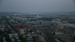 AX76_163 - 4.8K aerial stock footage of United States Capitol with Potomac River in the background, Washington, D.C., twilight