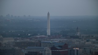 AX76_164 - 4.8K aerial stock footage of the Washington Monument in Washington, D.C., twilight