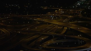 AX77_009 - 4.8K aerial stock footage approaching Interstate 95 and Richmond Highway Interchange, Alexandria, Virginia, night