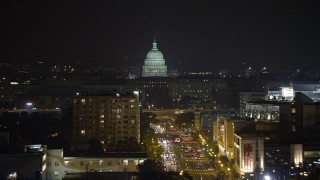 AX77_022E - 4.8K aerial stock footage of the United States Capitol in Washington, D.C., night